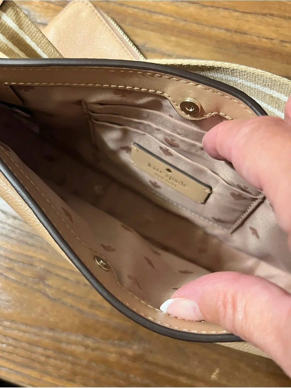 kate spade Pebbled Leather Crossbody Bag in Light Beige with Striped Strap